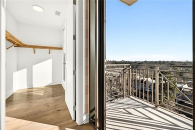 Set above the Buckhead skyline, this refined residence at The