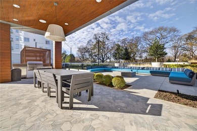 Set above the Buckhead skyline, this refined residence at The