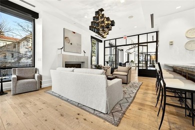 Set above the Buckhead skyline, this refined residence at The