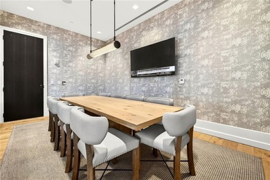 Set above the Buckhead skyline, this refined residence at The