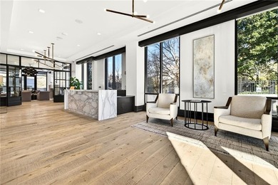 Set above the Buckhead skyline, this refined residence at The