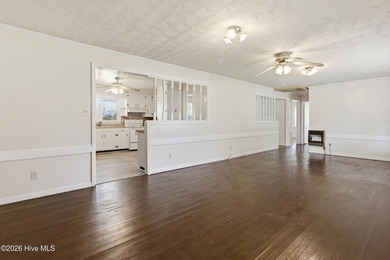 Situated on a rare full acre with no HOA, this cute brick home - photo 2