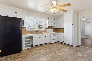 Situated on a rare full acre with no HOA, this cute brick home - photo 3