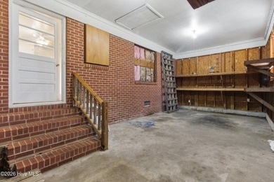 Situated on a rare full acre with no HOA, this cute brick home - photo 4