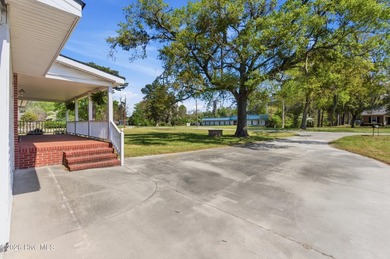 Situated on a rare full acre with no HOA, this cute brick home - photo 5