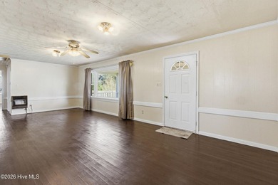 Situated on a rare full acre with no HOA, this cute brick home - photo 6