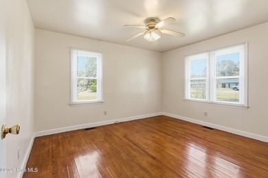 Situated on a rare full acre with no HOA, this cute brick home - photo 10