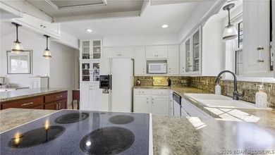 Darling lakefront GEM, cherished by one family for years is now - photo 18