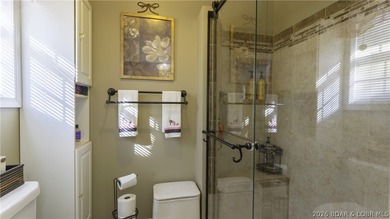 Darling lakefront GEM, cherished by one family for years is now - photo 28