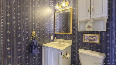 Darling lakefront GEM, cherished by one family for years is now - photo 30