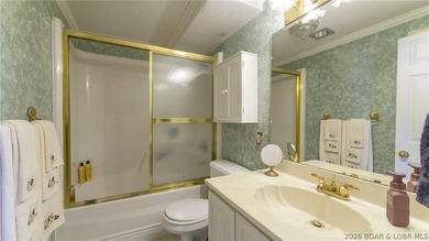 Darling lakefront GEM, cherished by one family for years is now - photo 36