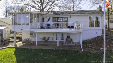 Darling lakefront GEM, cherished by one family for years is now - photo 49