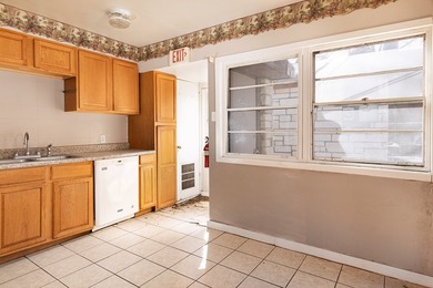 PRIME location with a paved parking lot, this Austin stone - photo 4