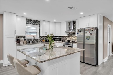 Welcome home to this recently updated property featuring a - photo 8