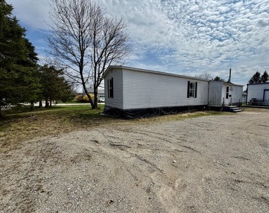 Affordable in-town mobile home situated on a spacious corner lot - photo 2