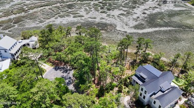 A Rare Waterfront Opportunity on Exclusive Deer Island! Bring - photo 20