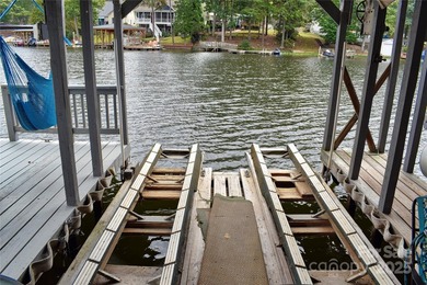 This waterfront home is located off Badin Lake's main channel - photo 12