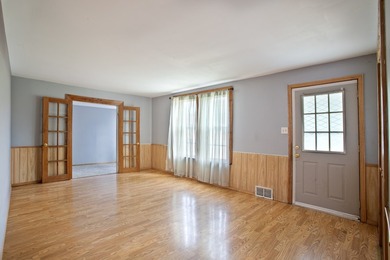 Welcome to this charming 3-bedroom, 2-bath home in the heart of - photo 3