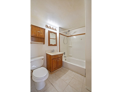 Welcome to this charming 3-bedroom, 2-bath home in the heart of - photo 8
