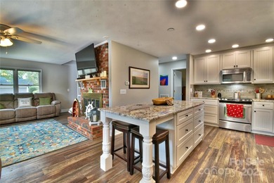 This waterfront home is located off Badin Lake's main channel - photo 20