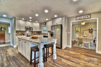 This waterfront home is located off Badin Lake's main channel - photo 21