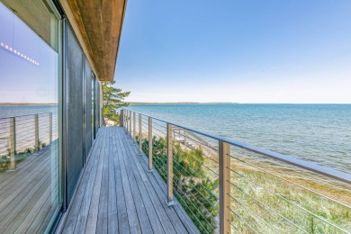 Located on Amagansett's coveted Cranberry Hole Road, this - photo 2