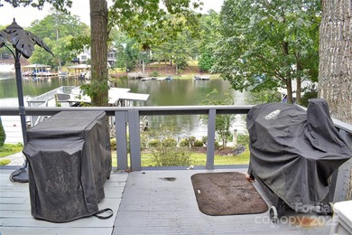 This waterfront home is located off Badin Lake's main channel - photo 30