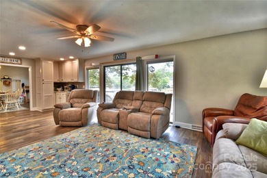 This waterfront home is located off Badin Lake's main channel - photo 31