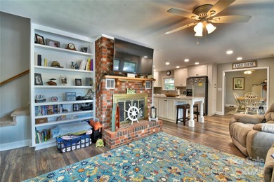 This waterfront home is located off Badin Lake's main channel - photo 32