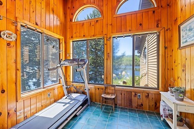 Nestled on the shores of beautiful Upper Narrows Pond, this - photo 3