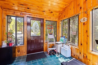 Nestled on the shores of beautiful Upper Narrows Pond, this - photo 4