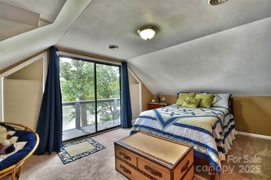 This waterfront home is located off Badin Lake's main channel - photo 37