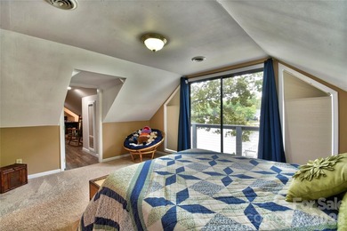 This waterfront home is located off Badin Lake's main channel - photo 38