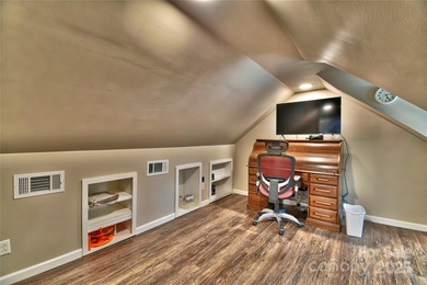 This waterfront home is located off Badin Lake's main channel - photo 45