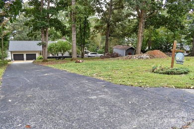 This waterfront home is located off Badin Lake's main channel - photo 46