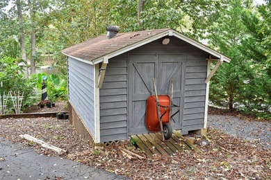 This waterfront home is located off Badin Lake's main channel - photo 47