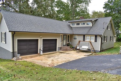This waterfront home is located off Badin Lake's main channel - photo 48