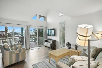 Experience island living at its finest in this beautifully