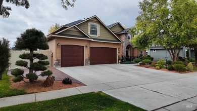 The Fall River Estates two-story home is located in the highly - photo 2