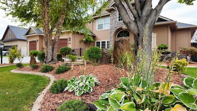 The Fall River Estates two-story home is located in the highly - photo 3