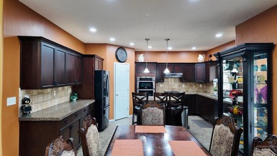 The Fall River Estates two-story home is located in the highly - photo 6