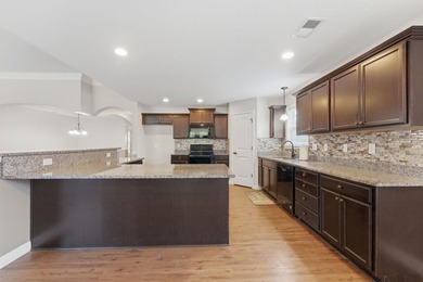 This spacious three-bedroom, two-and-a-half bath ranch on a - photo 11