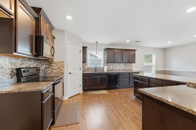 This spacious three-bedroom, two-and-a-half bath ranch on a - photo 12