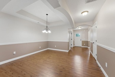 This spacious three-bedroom, two-and-a-half bath ranch on a - photo 14