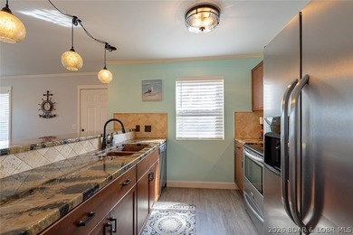 Indulge in breathtaking waterfront views from this beautifully - photo 15