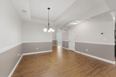 This spacious three-bedroom, two-and-a-half bath ranch on a - photo 15
