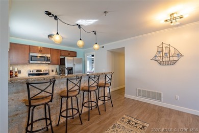 Indulge in breathtaking waterfront views from this beautifully - photo 16