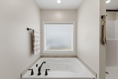 This spacious three-bedroom, two-and-a-half bath ranch on a - photo 22