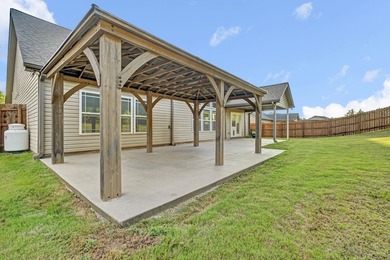 This spacious three-bedroom, two-and-a-half bath ranch on a - photo 30