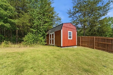 This spacious three-bedroom, two-and-a-half bath ranch on a - photo 35